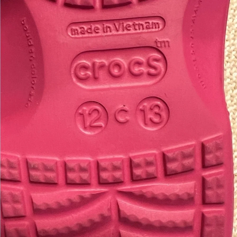 Kids CROCS lined Fuzzy Hot Pink with light pink faux fur. EUC